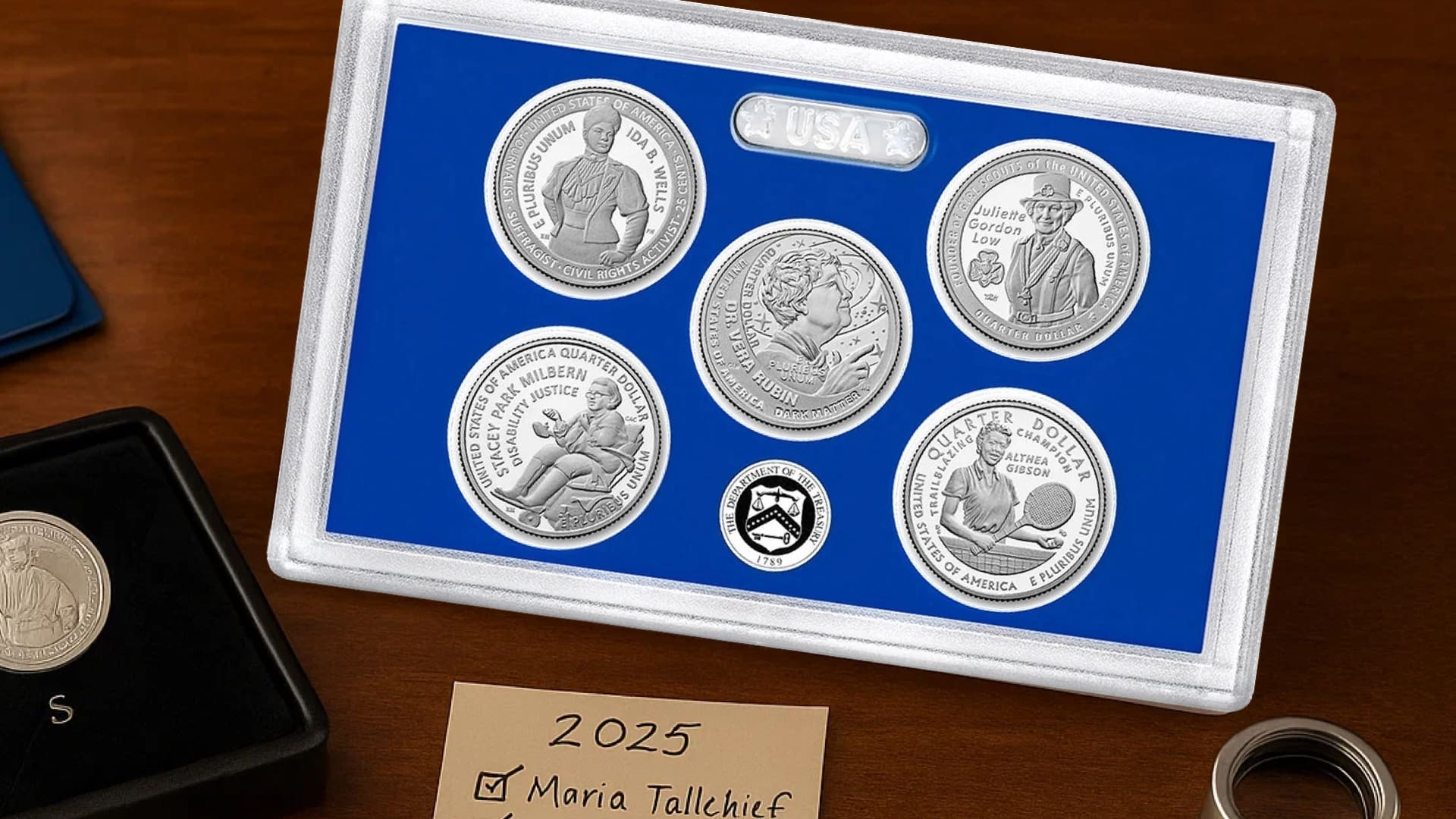 2025 American Women Quarters guide coins in tray with album and loupe